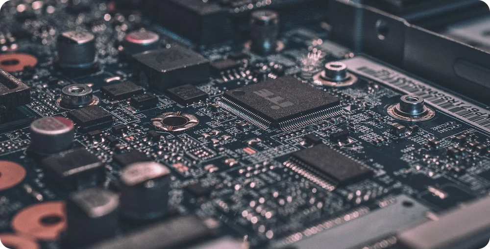 Close-up view of a computer motherboard showing chips and circuits
